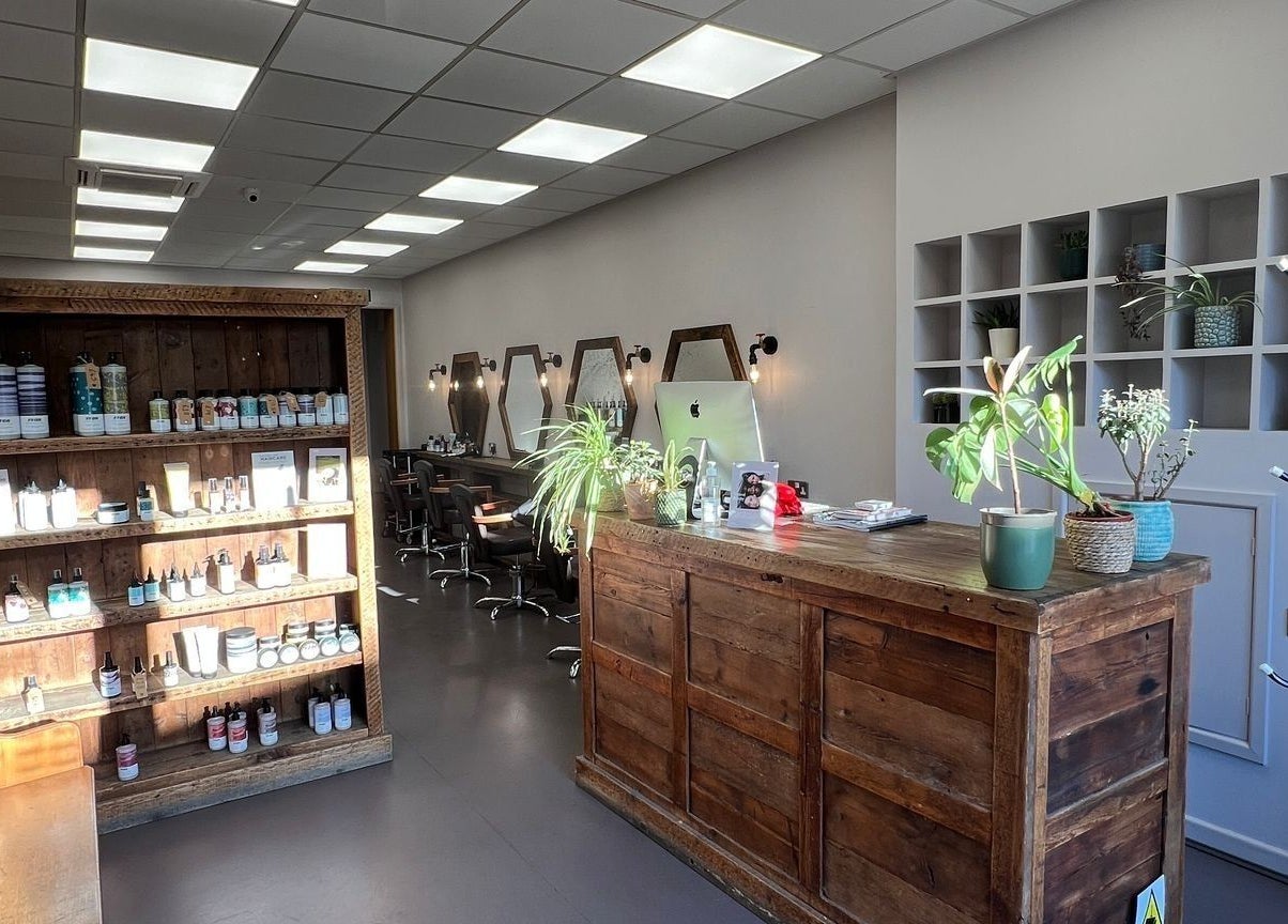 Her Studio's welcoming interior with wood decor at Grimsby, England, GB.