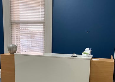 Reception desk at Absolute Wellbeing Mind & Body Pty Ltd in Ballarat Central, Victoria, AU with a modern aesthetic.