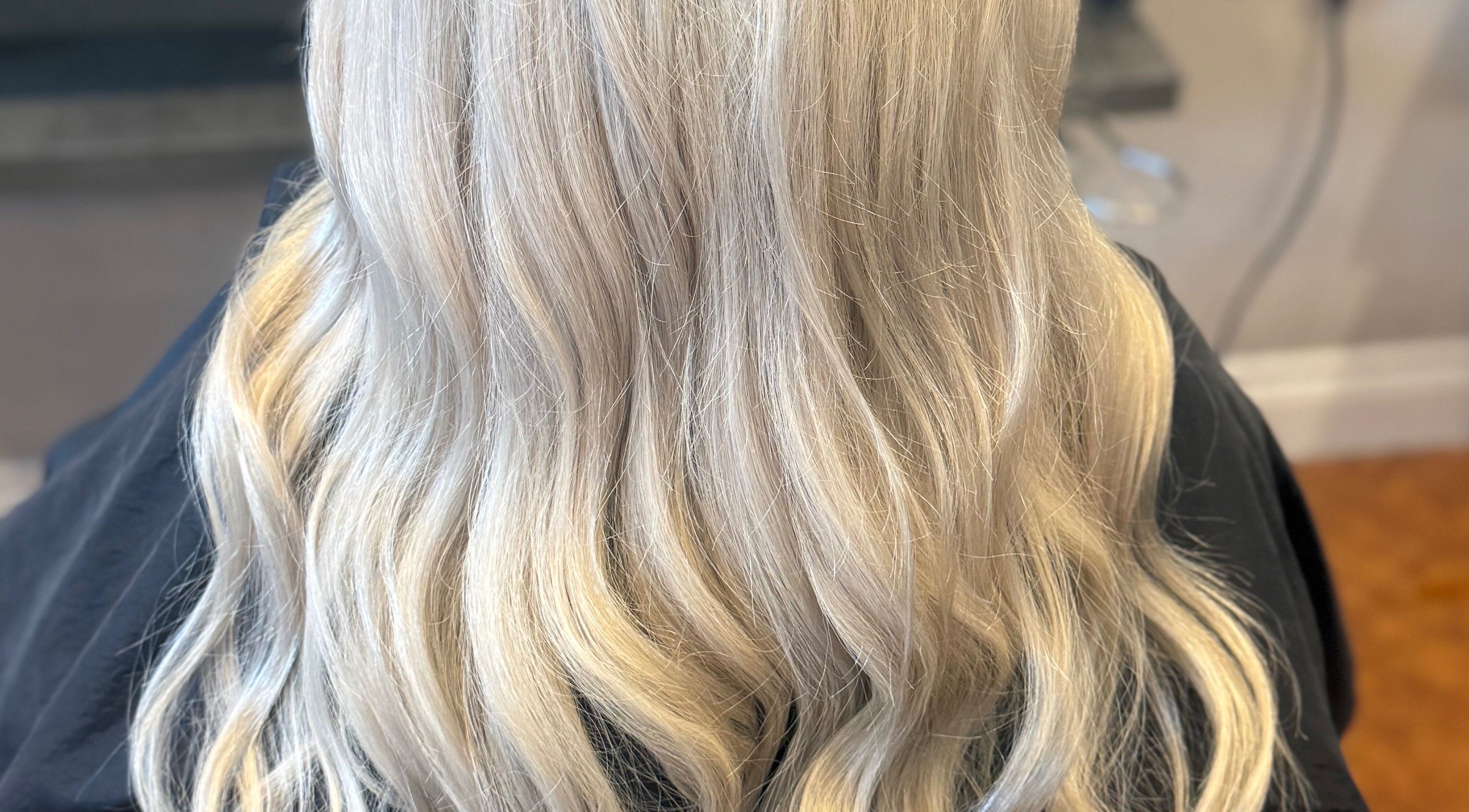 Blonde wavy hair transformation at Hairbyliamhansen in Dundee, Scotland, GB. Experience elegance and style.