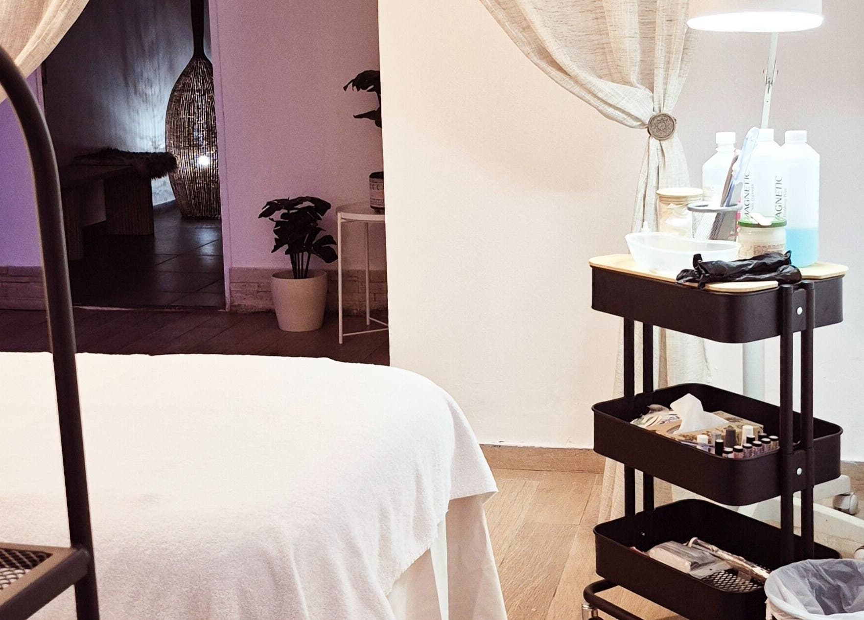 Relaxing treatment room at Blue Spa at Nausicaa Beach Hotel, Protaras, Ammochostos, CY with cozy decor.