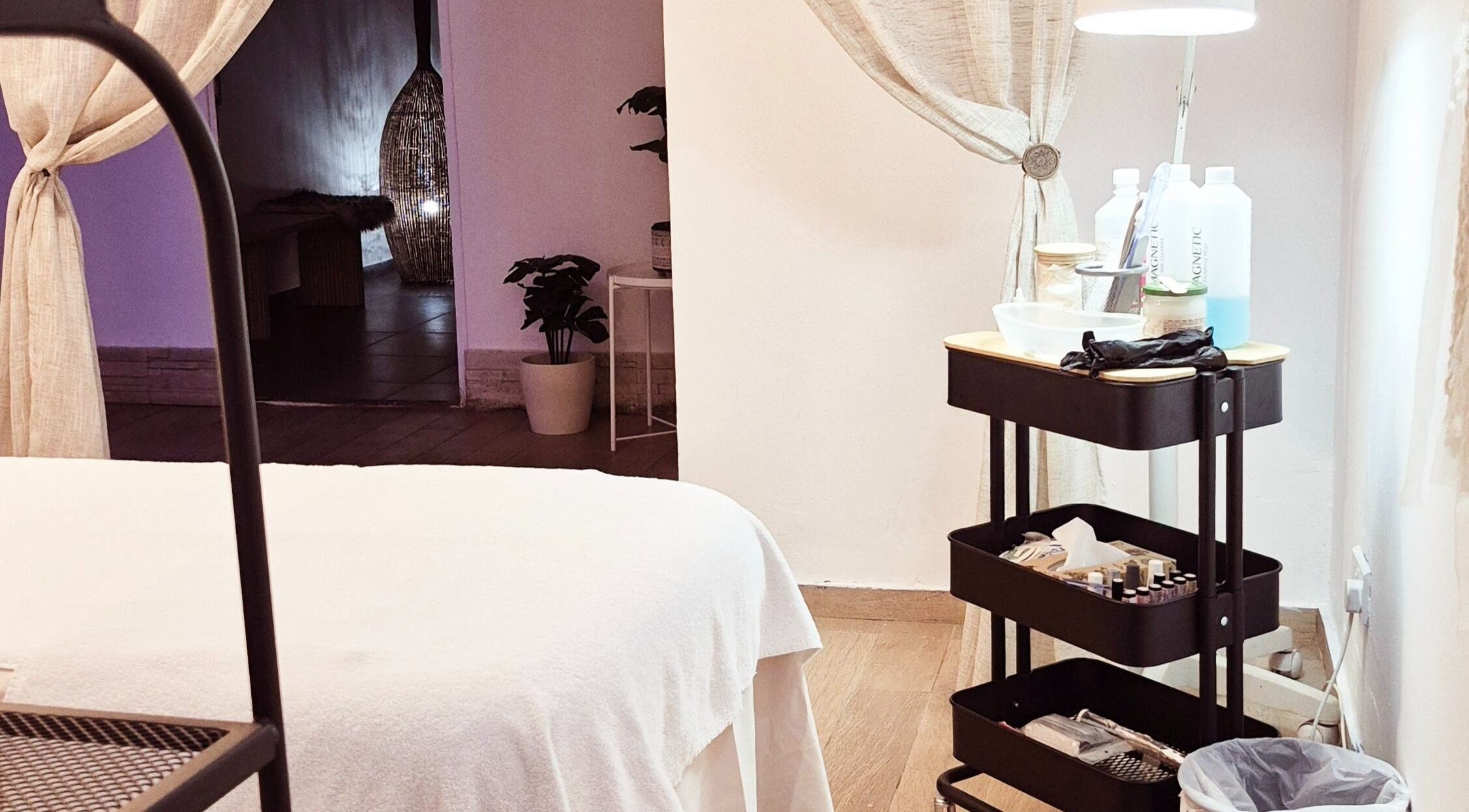 Relaxing treatment room at Blue Spa at Nausicaa Beach Hotel, Protaras, Ammochostos, CY with cozy decor.