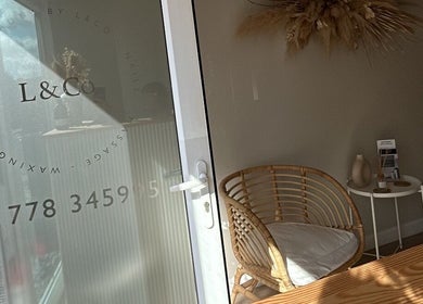 Entrance to Beauty by B in Market Deeping, England, GB, featuring chic wicker seating and decor.