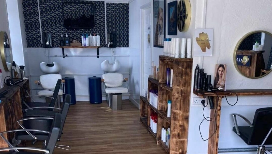 Interior of Calmante salon in Truro, England, GB showcasing modern hair styling stations.