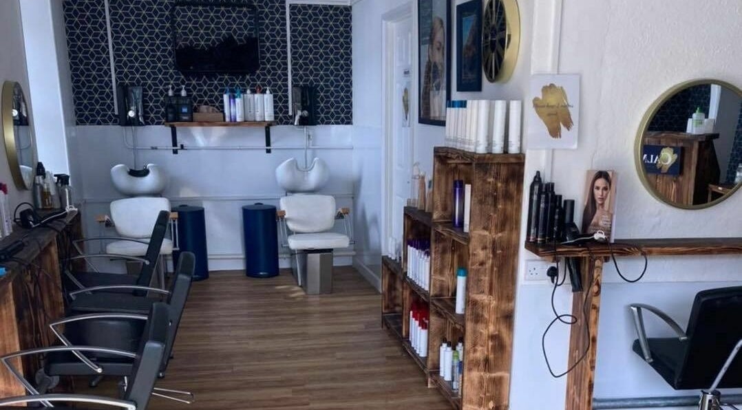 Interior of Calmante salon in Truro, England, GB showcasing modern hair styling stations.