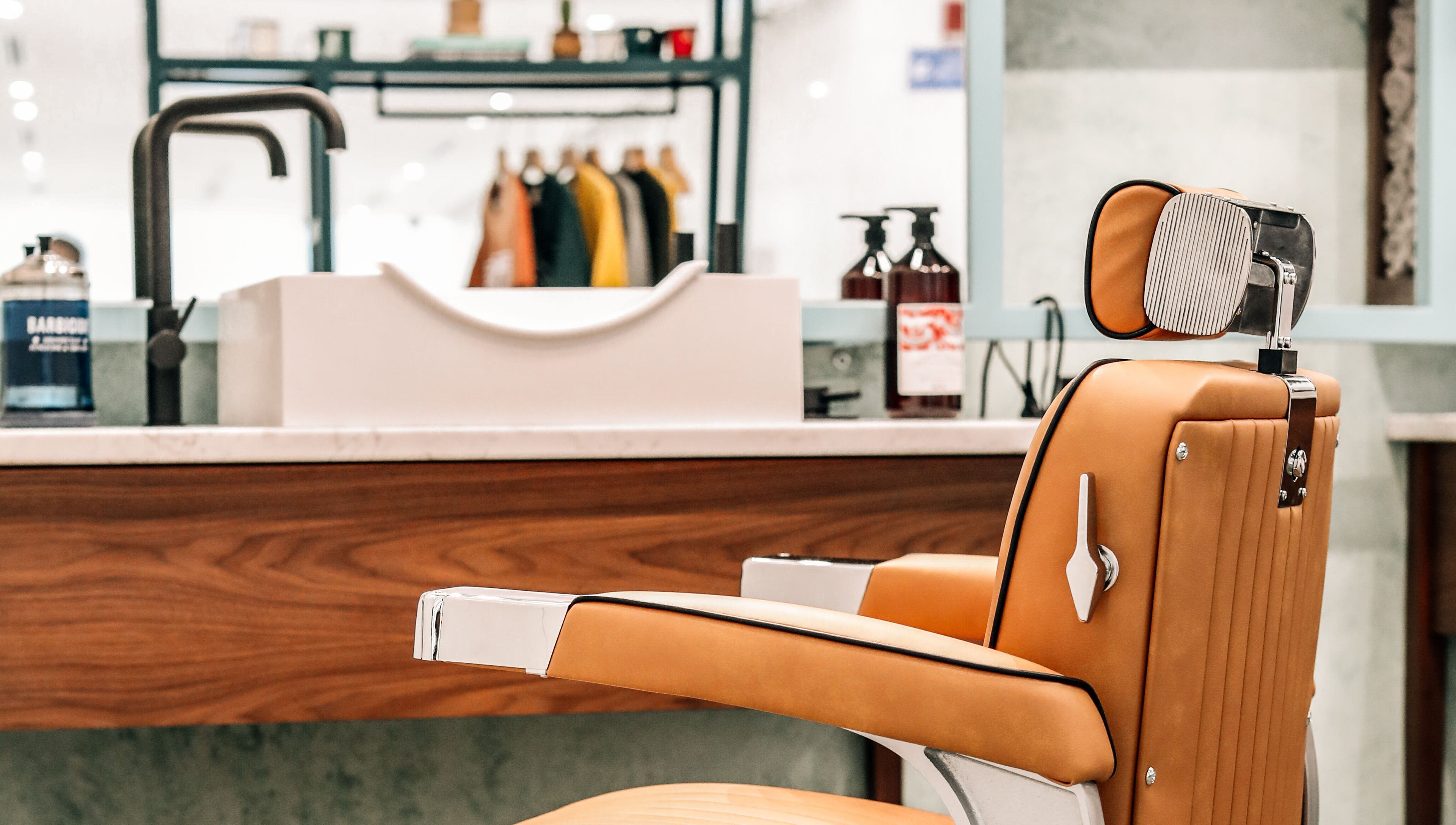 Stylish barber chair at Bo Barbershop, Dubai, AE, showcasing modern design and comfort.