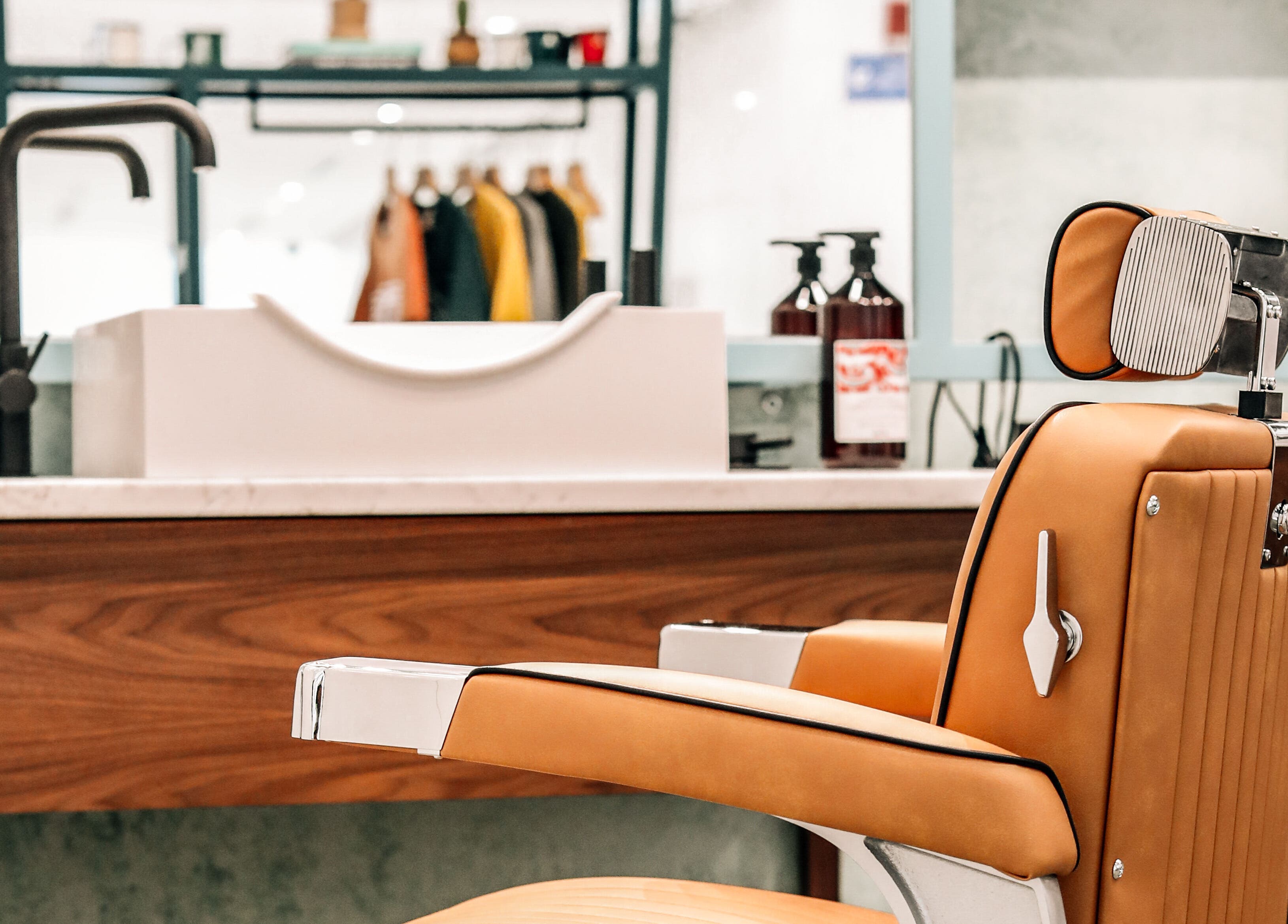Stylish barber chair at Bo Barbershop, Dubai, AE, showcasing modern design and comfort.