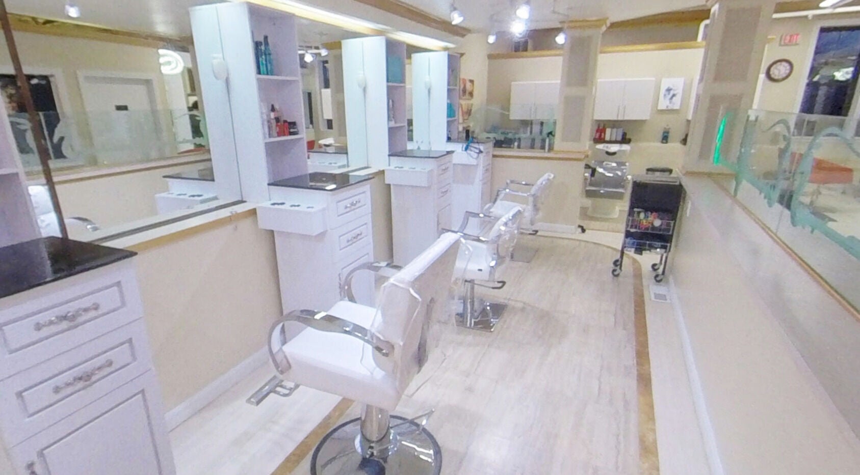 Modern salon chairs and mirrors at Alicia Studio 13 in Haverhill, Massachusetts, US.