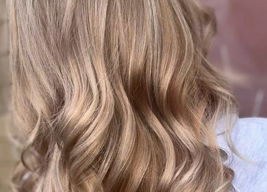 Blonde wavy hair styled at S Y SALON Stockton, Stockton-on-tees, England, GB, showcasing expert coloring.