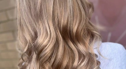 Blonde wavy hair styled at S Y SALON Stockton, Stockton-on-tees, England, GB, showcasing expert coloring.
