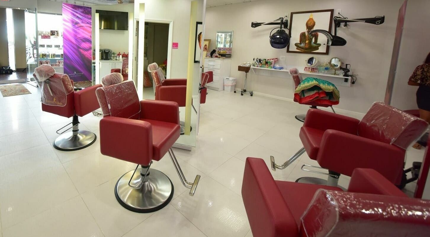Spacious interior of Shahnaz Husain Franchise Salon in Hicksville, New York, US, featuring modern styling chairs.