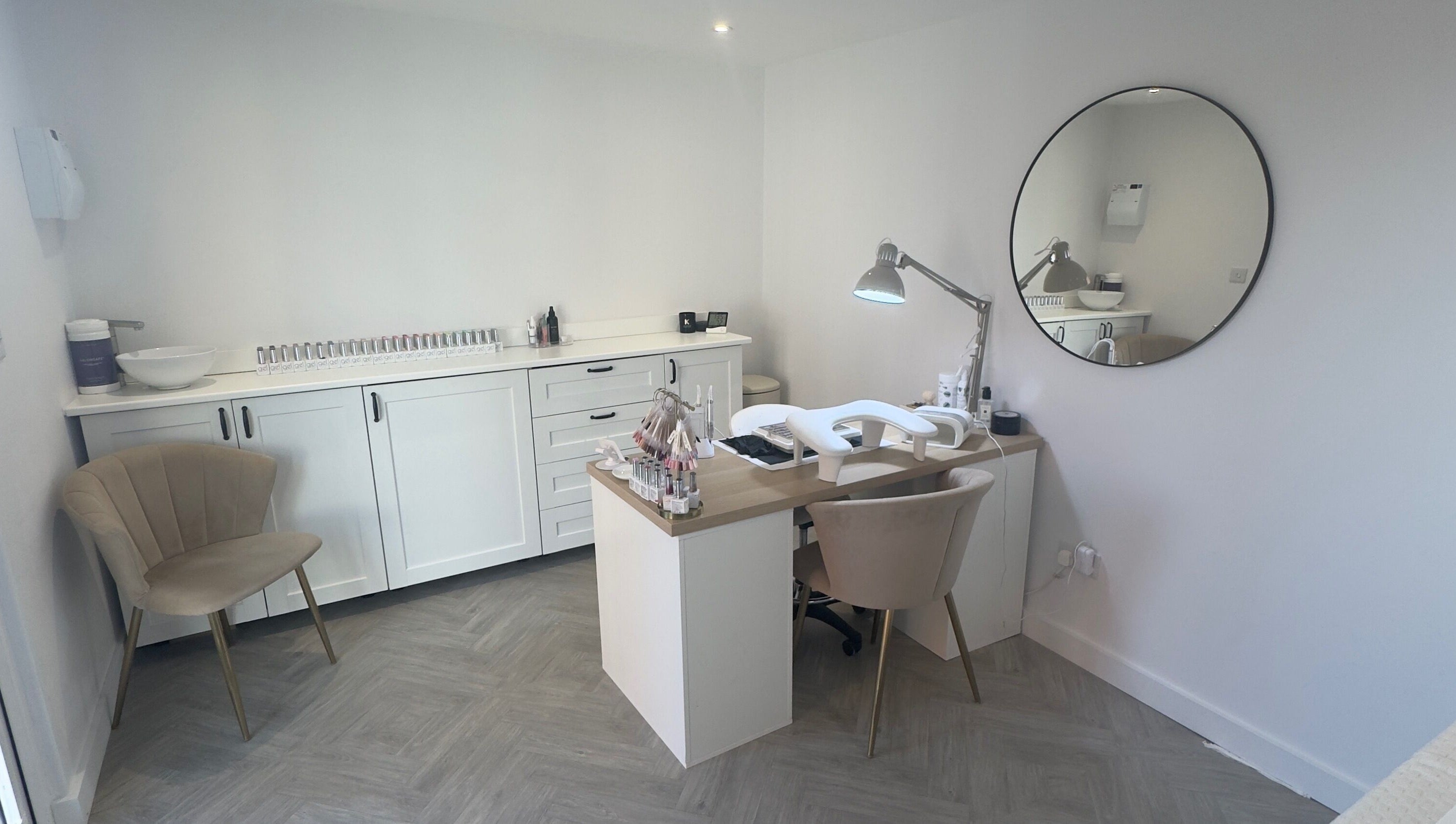 Elegant nail salon at LCBeauty, Swindon, England, GB featuring a modern manicure setup and stylish decor.