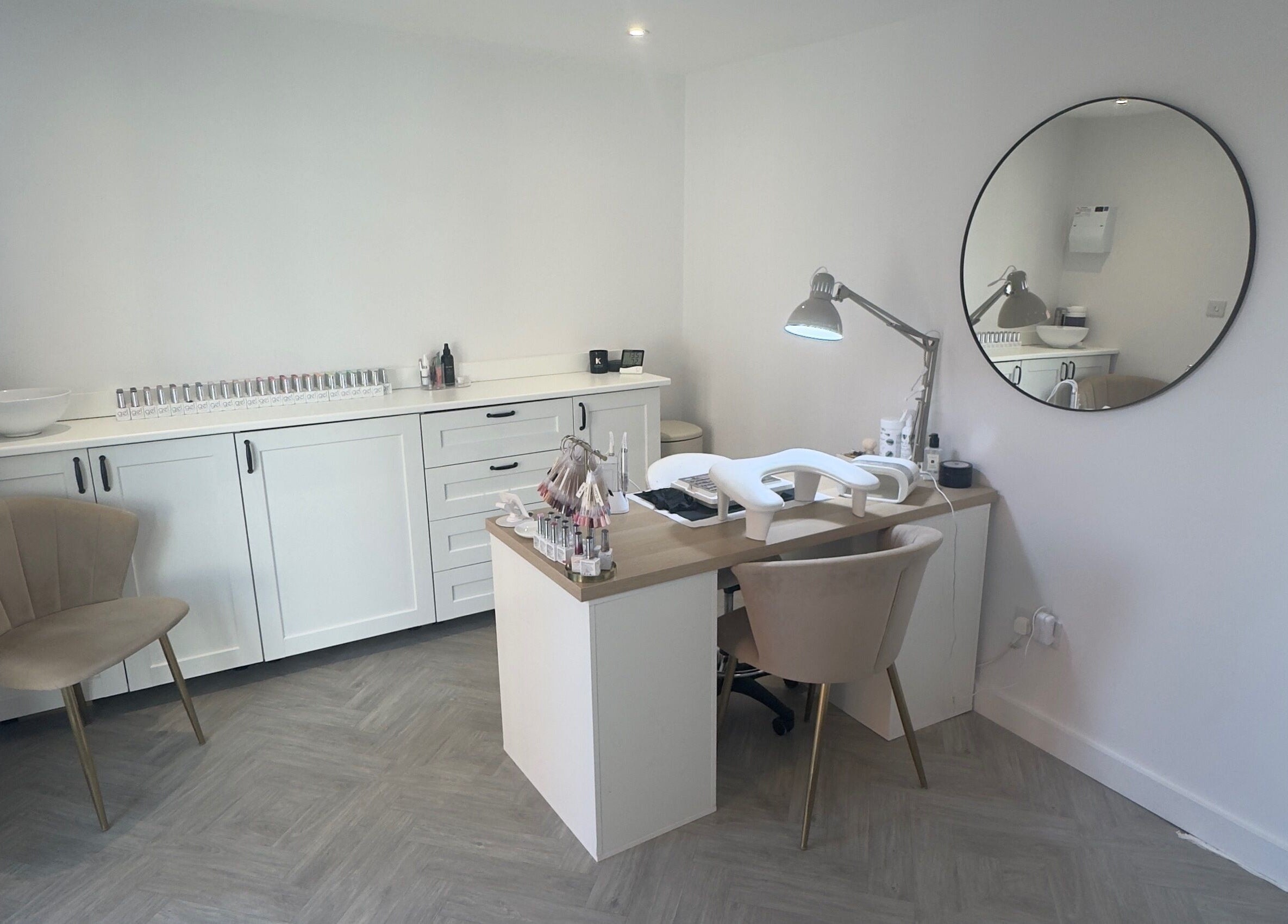 Elegant nail salon at LCBeauty, Swindon, England, GB featuring a modern manicure setup and stylish decor.