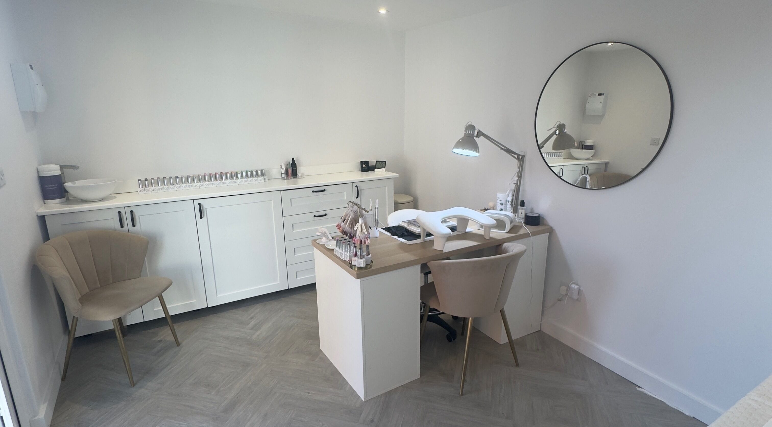 Elegant nail salon at LCBeauty, Swindon, England, GB featuring a modern manicure setup and stylish decor.