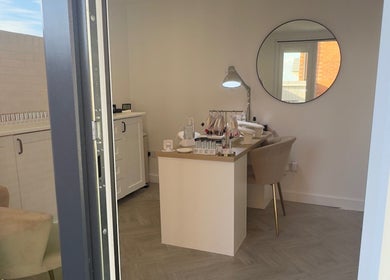 Modern nail studio at LCBeauty, Swindon, England, GB. Features cozy chairs and elegant decor.