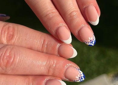 Elegant nail art with floral tips at LCBeauty, Swindon, England, GB. Perfect for a stylish look.