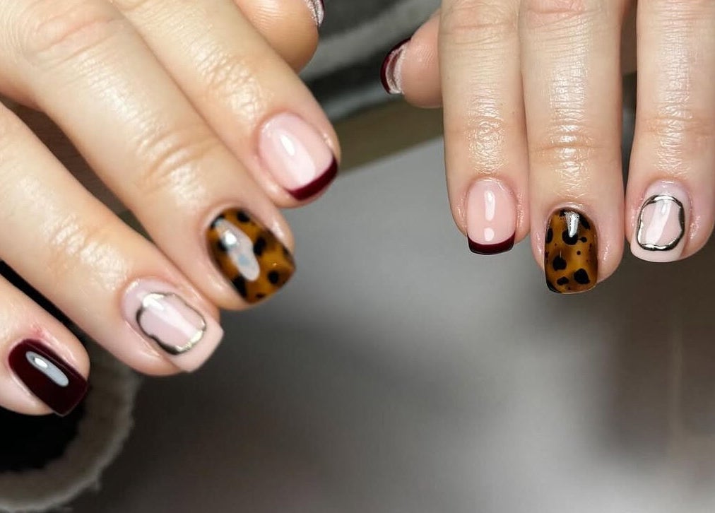 Stylish manicure with leopard print design at LCBeauty, Swindon, England, GB.
