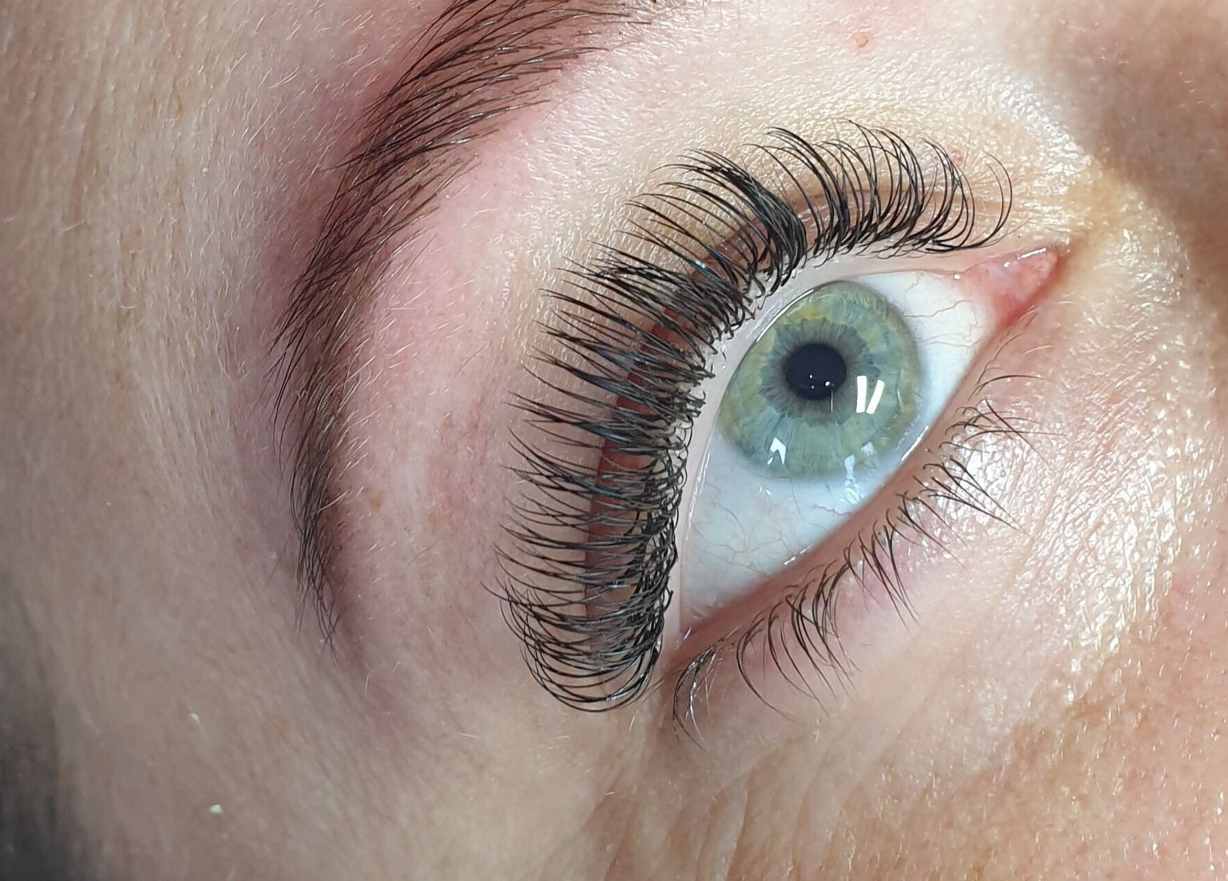Close-up of enhanced eyelashes at Affinity Beauty Windsor, Windsor, England, GB. Luxurious lash extension.