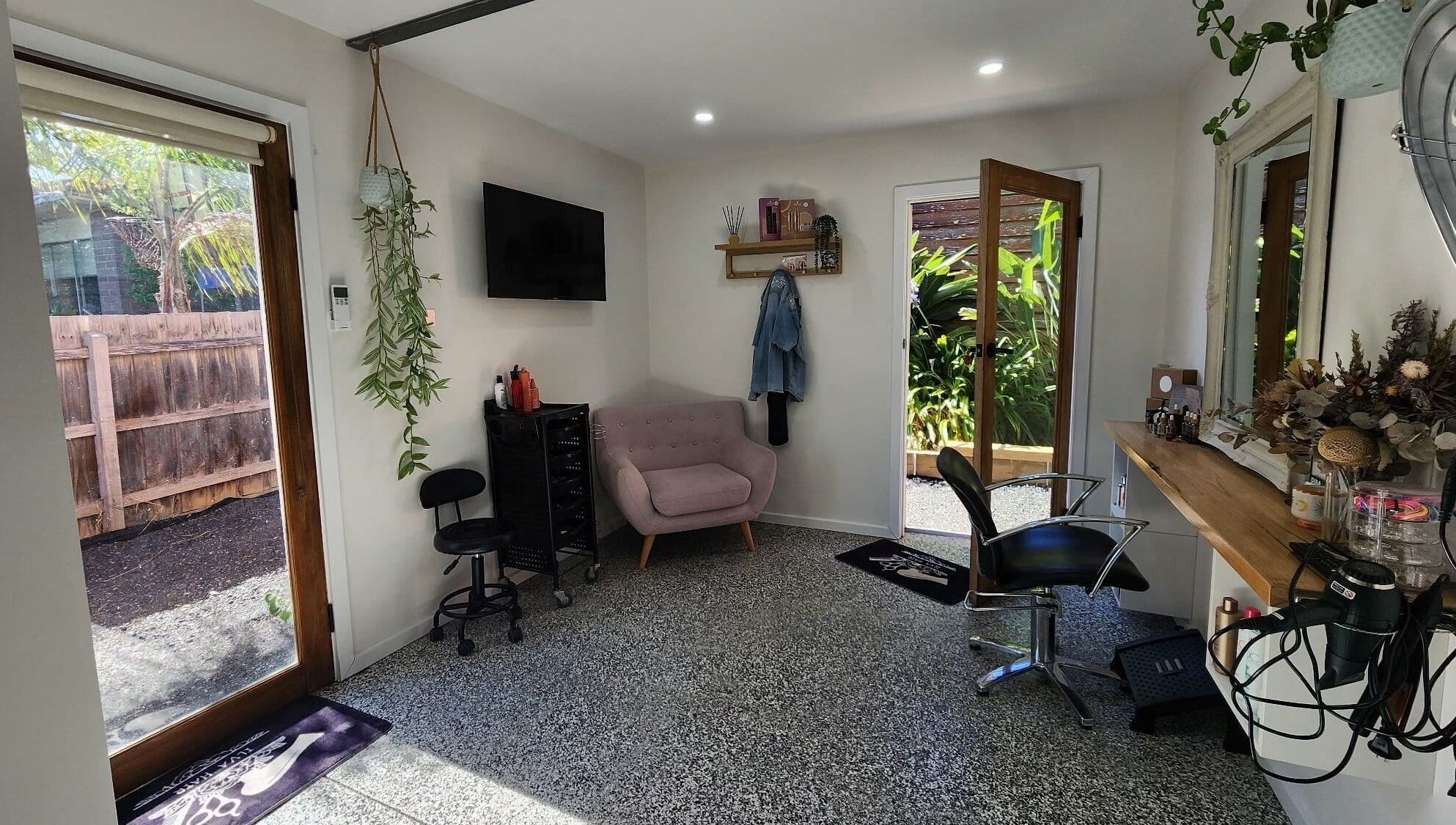 Chic interior of Ilva in Melbourne, Victoria, AU, showcasing a serene lounge area with stylish decor and natural light.