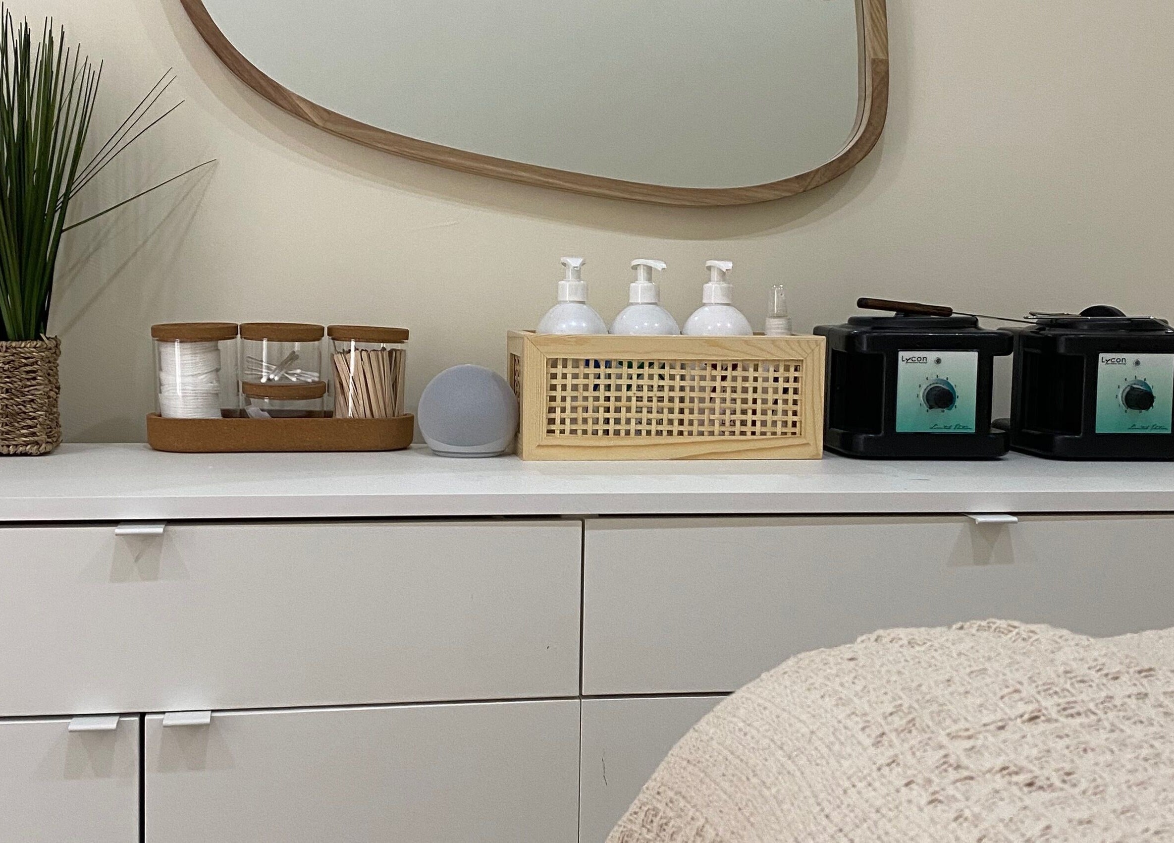 Oh So Pretty venue in Wigston, England, featuring a stylish countertop with beauty essentials and decor.