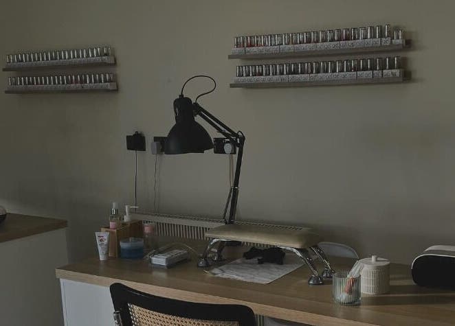 Chic nail station at Oh So Pretty in Wigston, England, GB with sleek design and polish display.