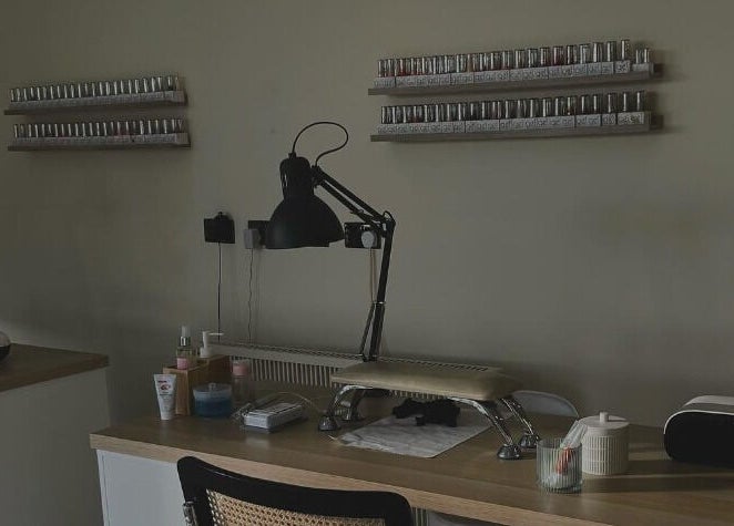 Chic nail station at Oh So Pretty in Wigston, England, GB with sleek design and polish display.