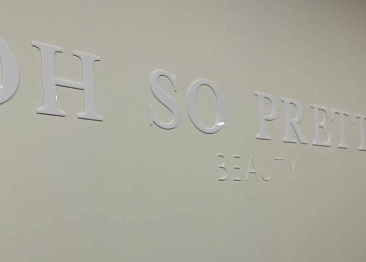 Oh So Pretty sign on the wall of Wigston beauty venue, England, GB
