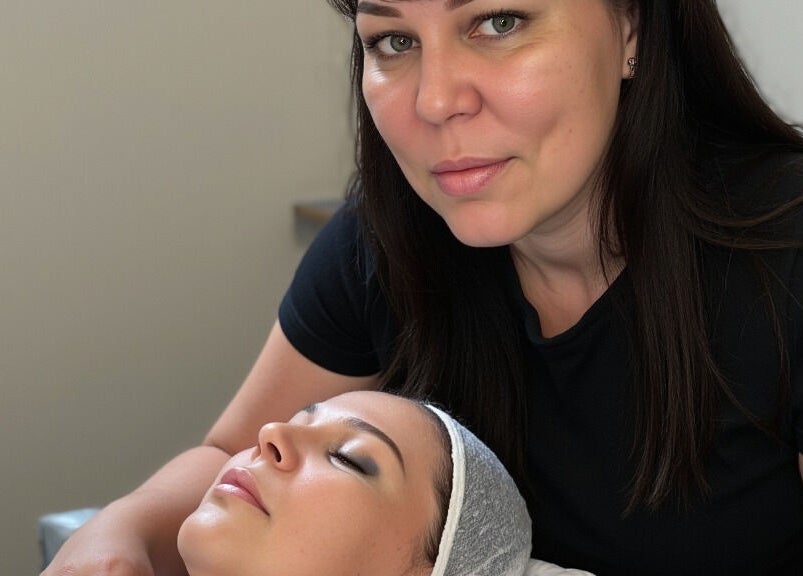 Facial treatment at Erene Beauty Studio, Bathgate, Scotland, GB, with beautician and relaxed client.
