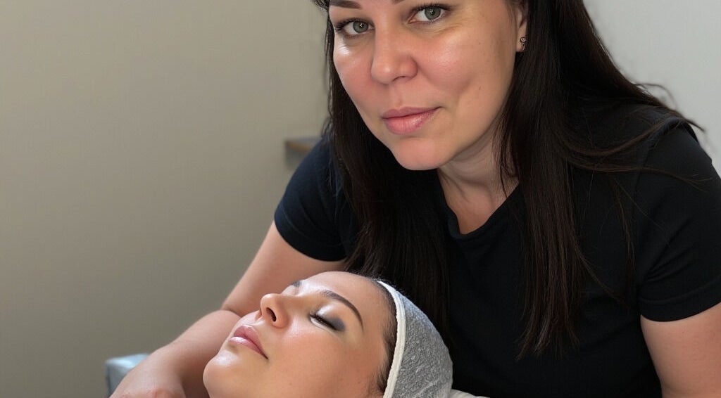 Facial treatment at Erene Beauty Studio, Bathgate, Scotland, GB, with beautician and relaxed client.