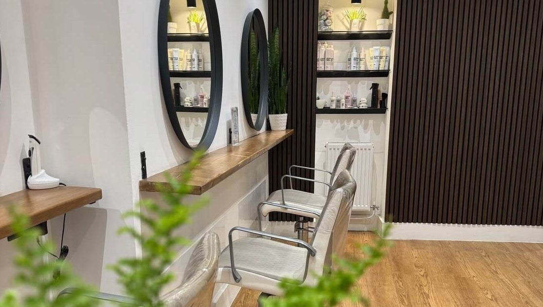 Modern salon interior with stylish mirrors at Create Salon, Cardiff, Wales, GB.