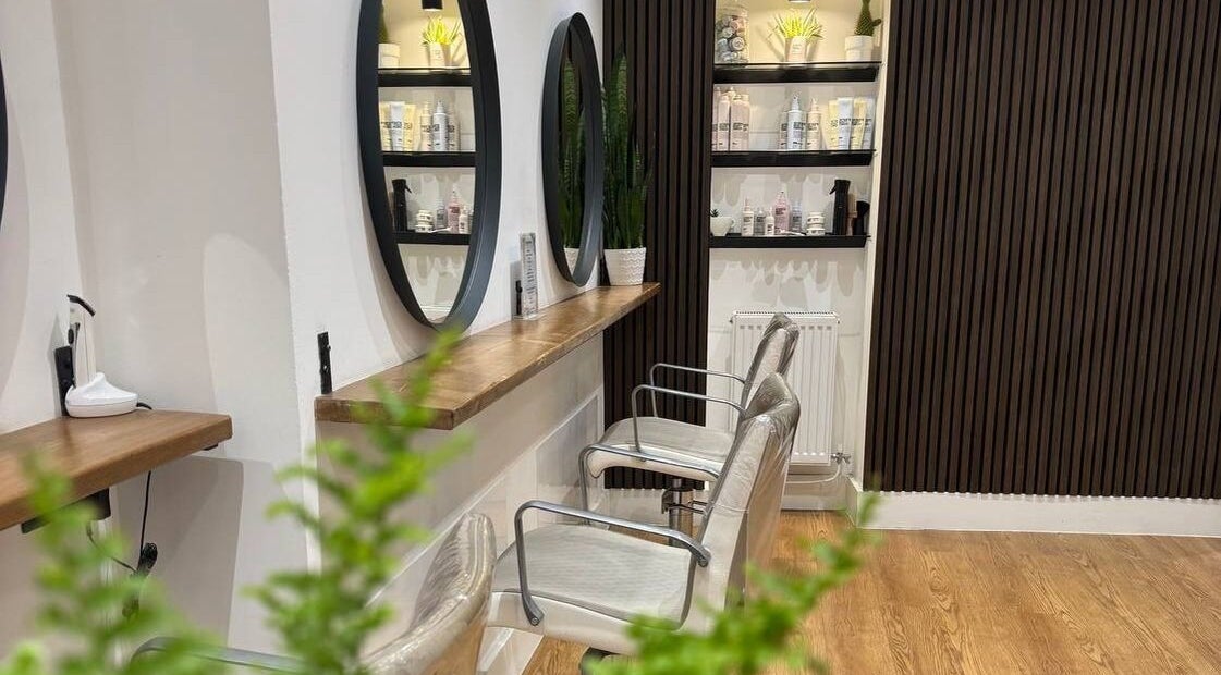 Modern salon interior with stylish mirrors at Create Salon, Cardiff, Wales, GB.