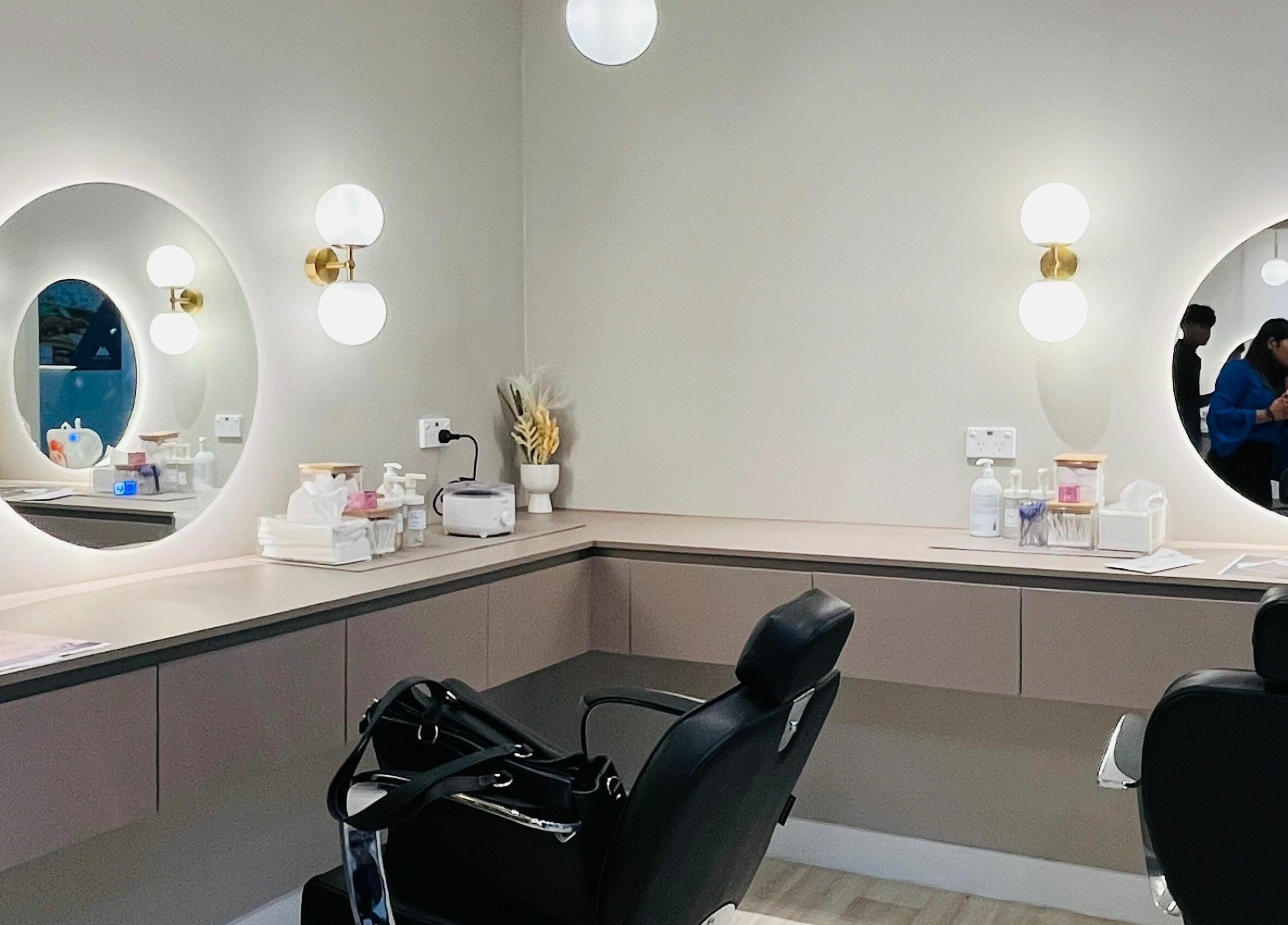 Elegant beauty room at Tulip Lash n Brow, Baulkham Hills, New South Wales, AU with stylish decor and vanity stations.