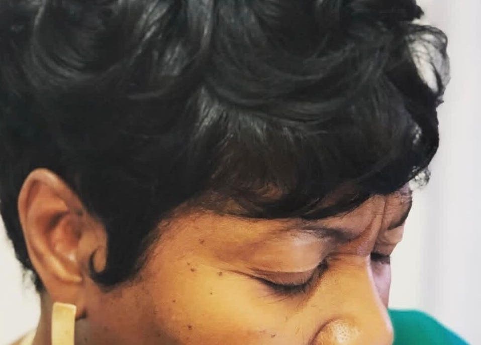 Stylish short haircut at New Vision Hair Studio, Columbia, South Carolina, US.