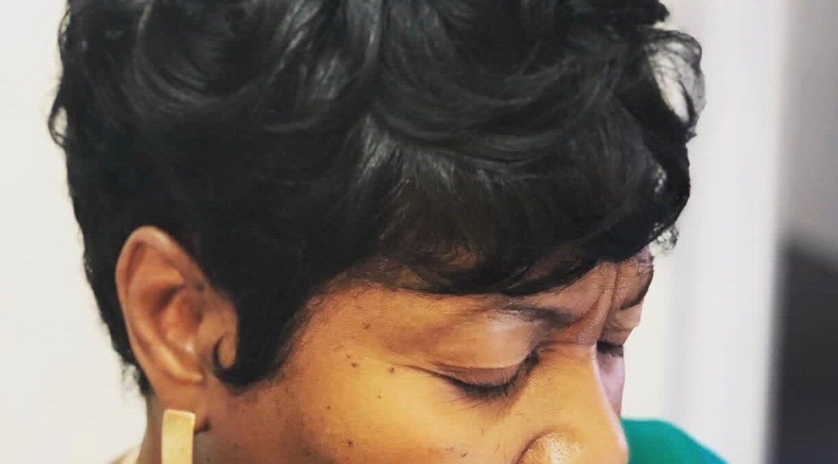 Stylish short haircut at New Vision Hair Studio, Columbia, South Carolina, US.