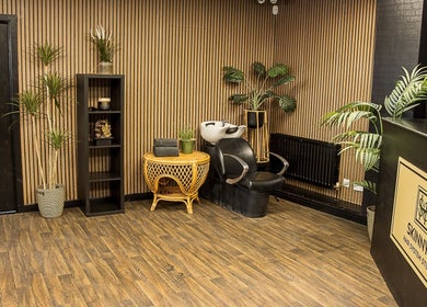 Elegant interior of Skinny Isaac's Barber Shop & Hair System Studio, Belfast, Northern Ireland, GB.