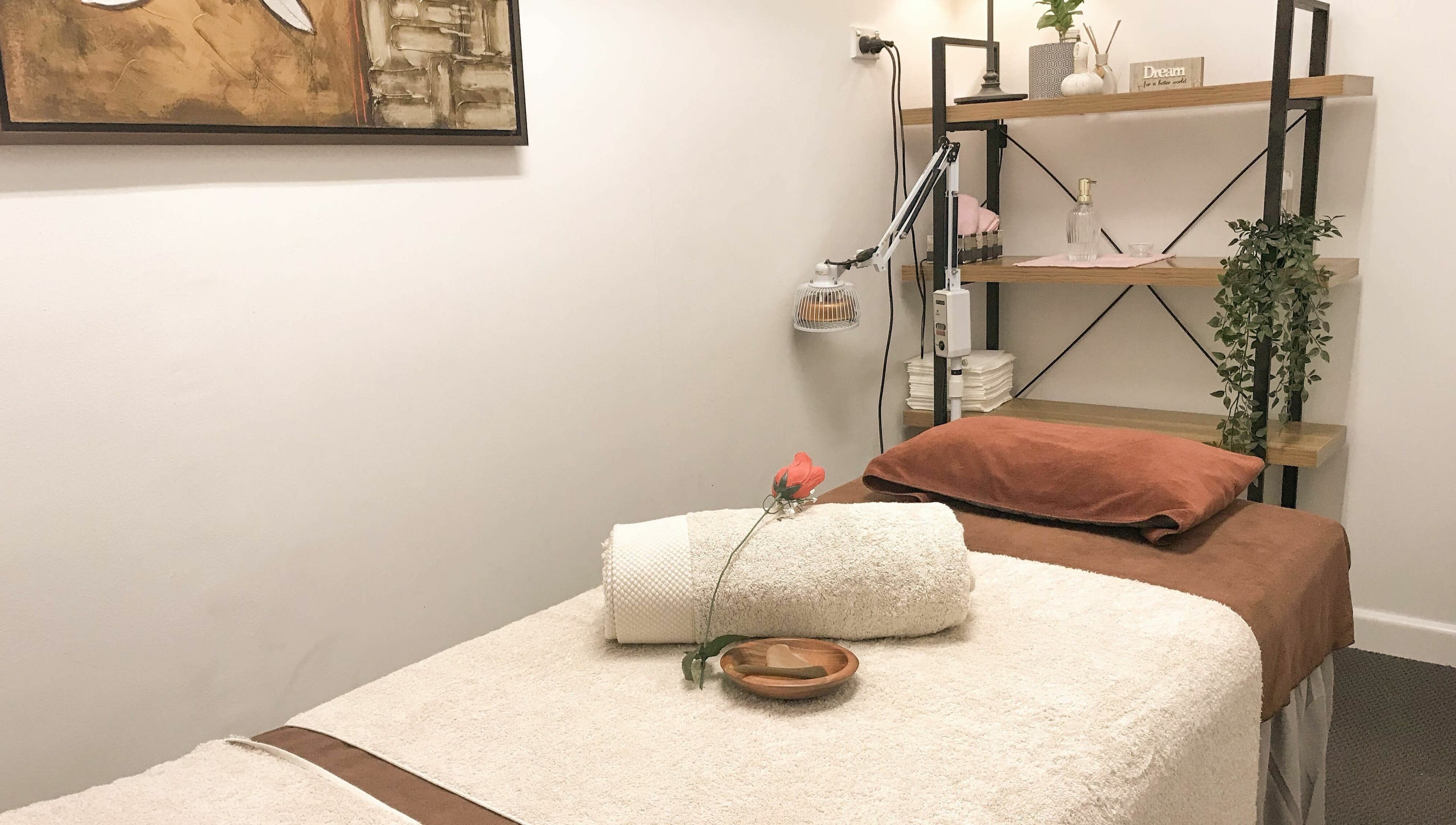 Relaxing treatment room at Kamiya Day Spa, Ashburton, Victoria, AU. Calming ambiance with towels and decor.