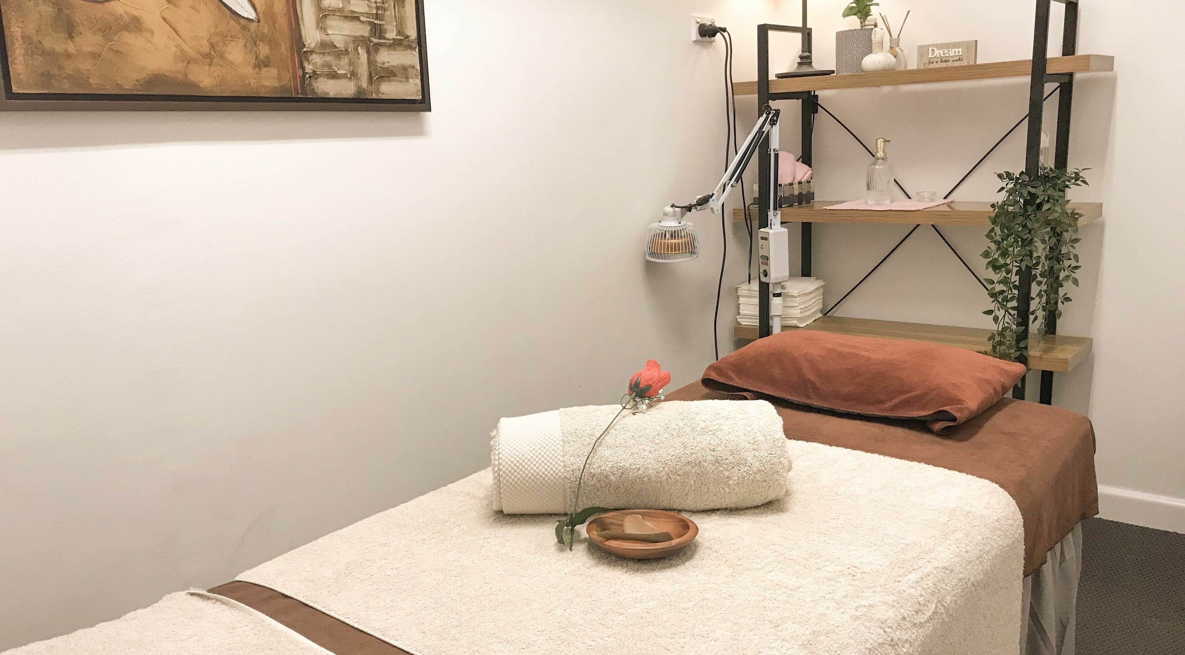 Relaxing treatment room at Kamiya Day Spa, Ashburton, Victoria, AU. Calming ambiance with towels and decor.