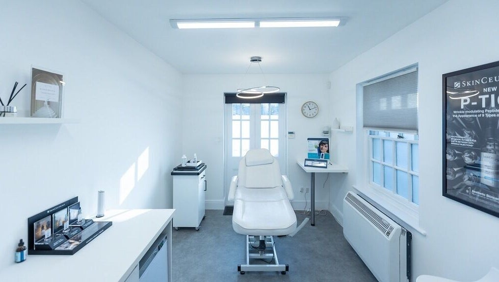 A calming treatment room at Update Aesthetics Lemon Street, Truro, England, GB featuring a treatment chair.
