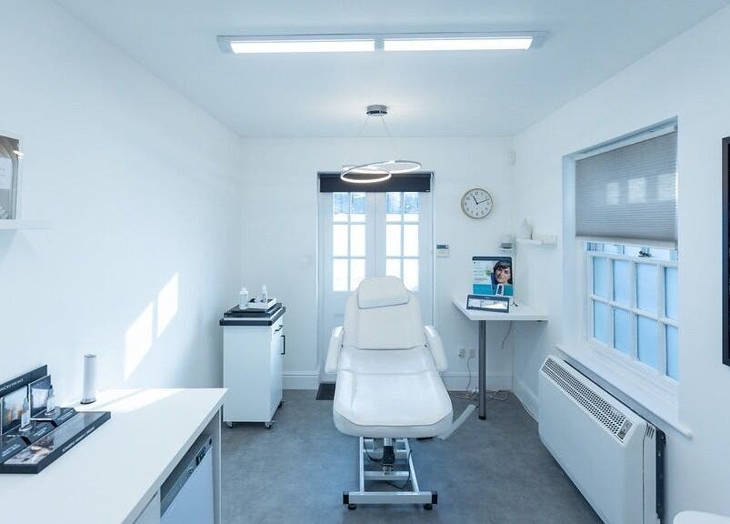 A calming treatment room at Update Aesthetics Lemon Street, Truro, England, GB featuring a treatment chair.