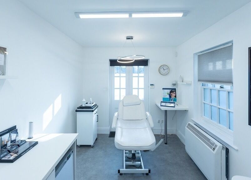 A calming treatment room at Update Aesthetics Lemon Street, Truro, England, GB featuring a treatment chair.