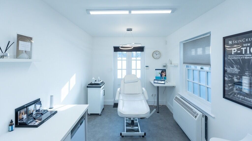 A calming treatment room at Update Aesthetics Lemon Street, Truro, England, GB featuring a treatment chair.