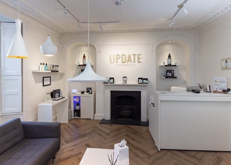 Stylish interior of Update Aesthetics Lemon Street in Truro, England, GB featuring sleek decor and cozy seating.
