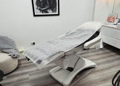 Cozy treatment room at Vanish Laser & Skin, Melbourne, Victoria, AU, featuring a comfortable chair and modern decor.