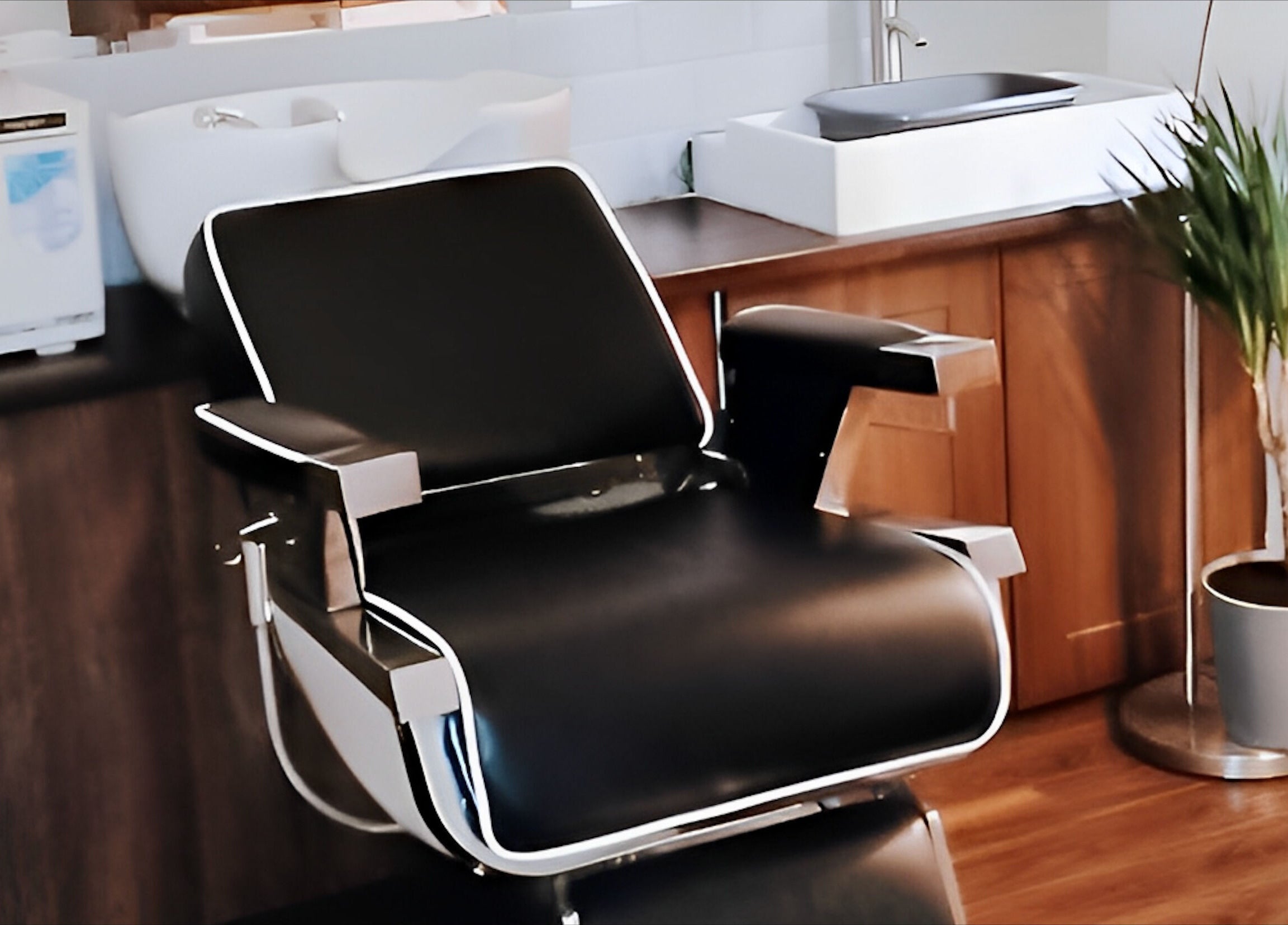 Modern barber chair at Mrsnips, a salon in Dublin, County Dublin, IE showcasing sleek design and comfort.