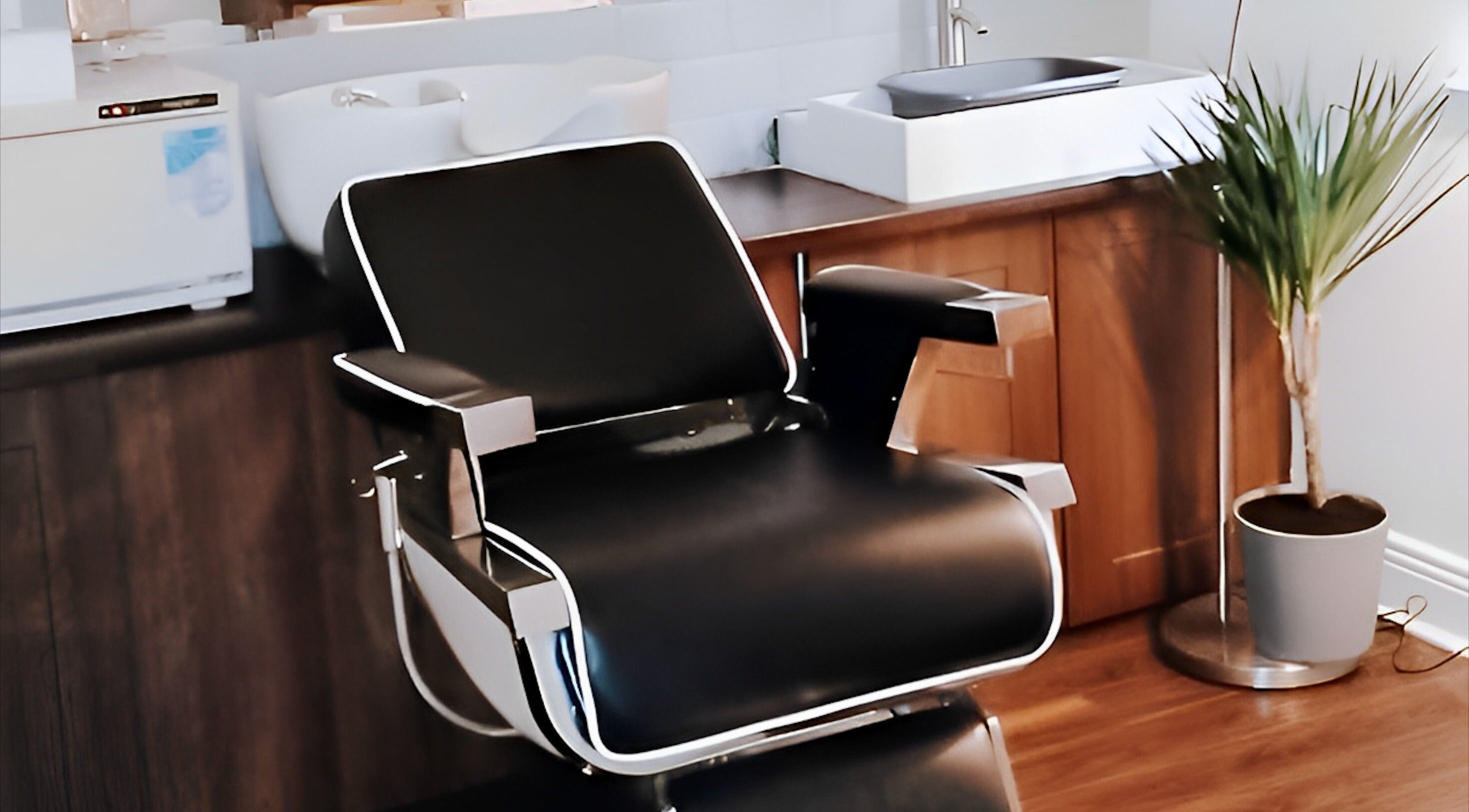 Modern barber chair at Mrsnips, a salon in Dublin, County Dublin, IE showcasing sleek design and comfort.