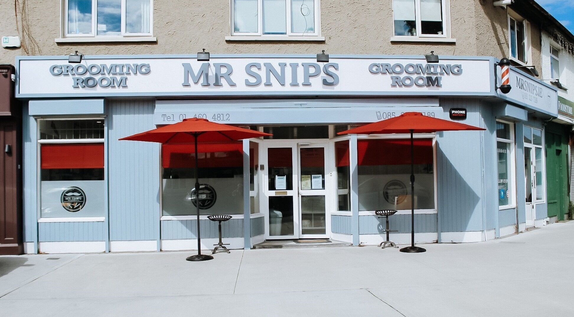 Exterior of Mrsnips salon with red canopies in Dublin, County Dublin, IE, showcasing a welcoming entrance.