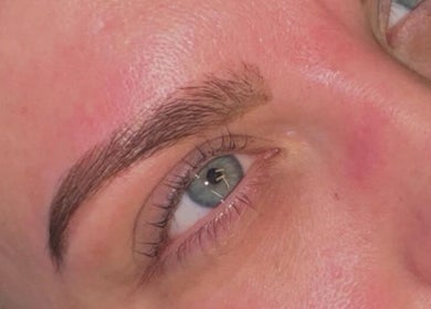Closeup of perfectly shaped eyebrow at Lovelli Salon & Training Academy, Halfway, England, GB.