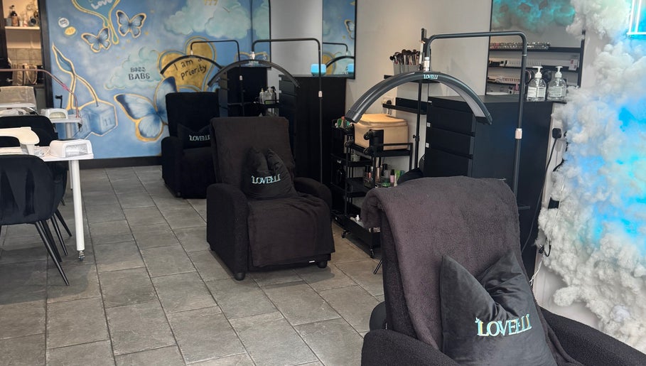 Relaxing chairs at Lovelli Salon & Training Academy, Halfway, England, GB, featuring modern decor and soothing ambience.