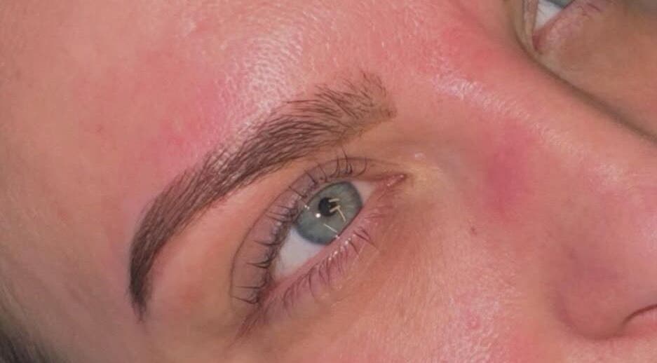 Close-up of expertly shaped eyebrows at Lovelli Salon & Training Academy, Halfway, England, GB.