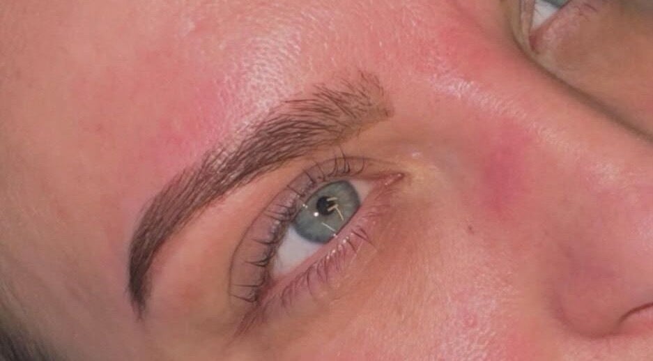 Close-up of expertly shaped eyebrows at Lovelli Salon & Training Academy, Halfway, England, GB.
