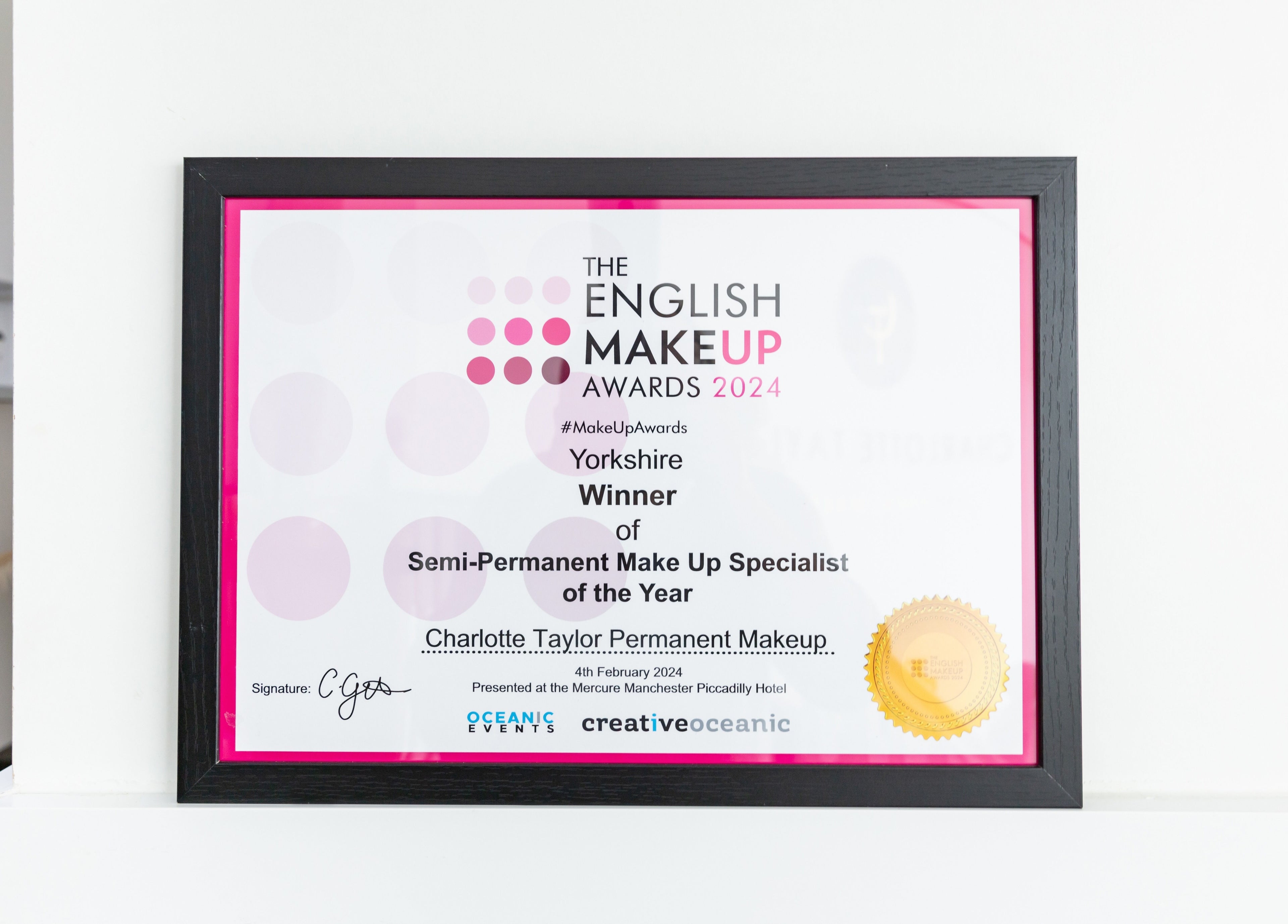 Award certificate at Charlotte Taylor Permanent Makeup Leeds Clinic in Yeadon, England, GB, showcasing excellence.